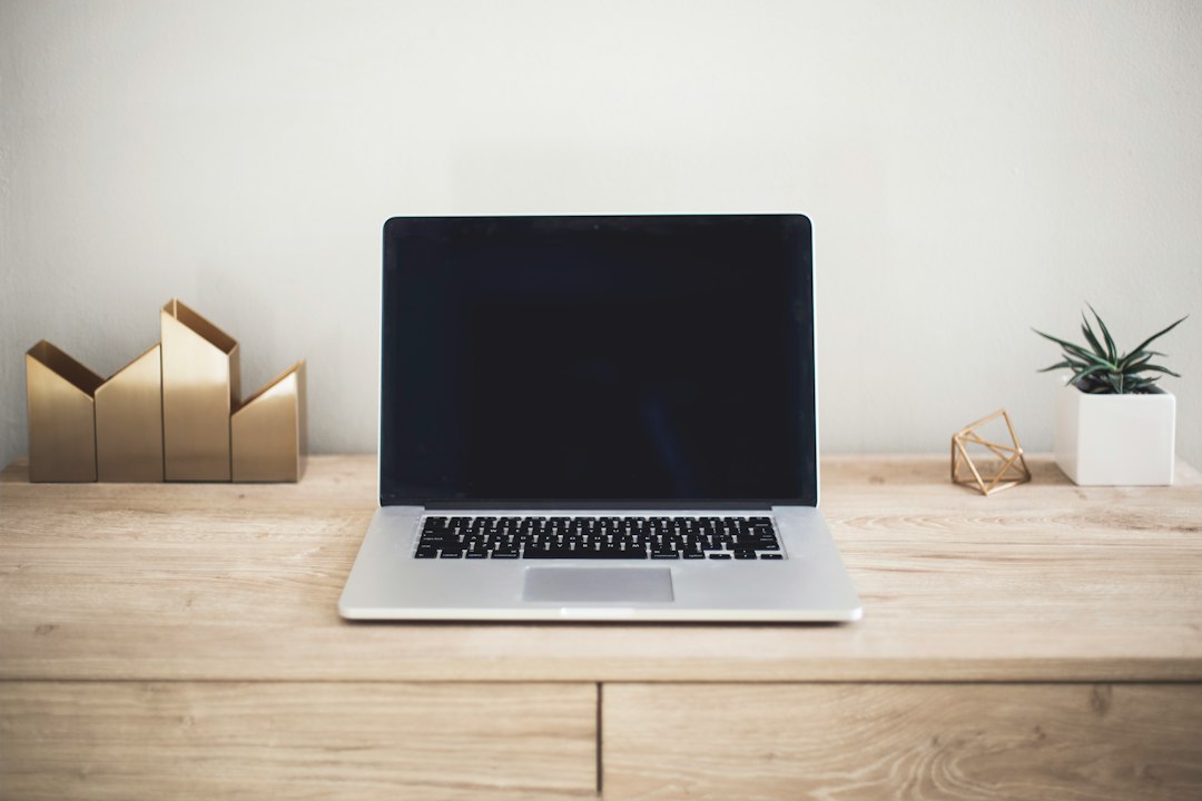 Business laptop on a wooden desk, representing the new wave of enterprise notebooks launching in India