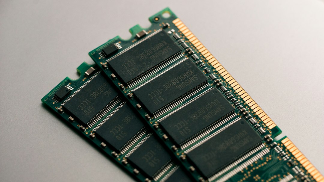 Close-up of green RAM memory module circuit boards