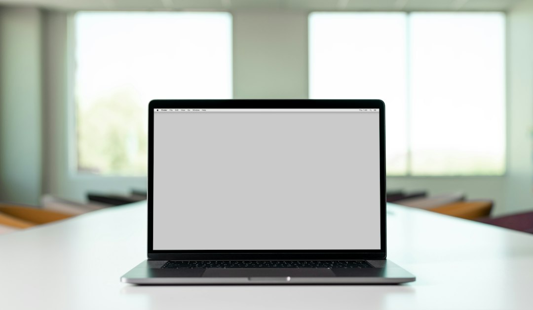 Laptop computer on a desk in a home workspace, representing budget laptop buying decisions in India