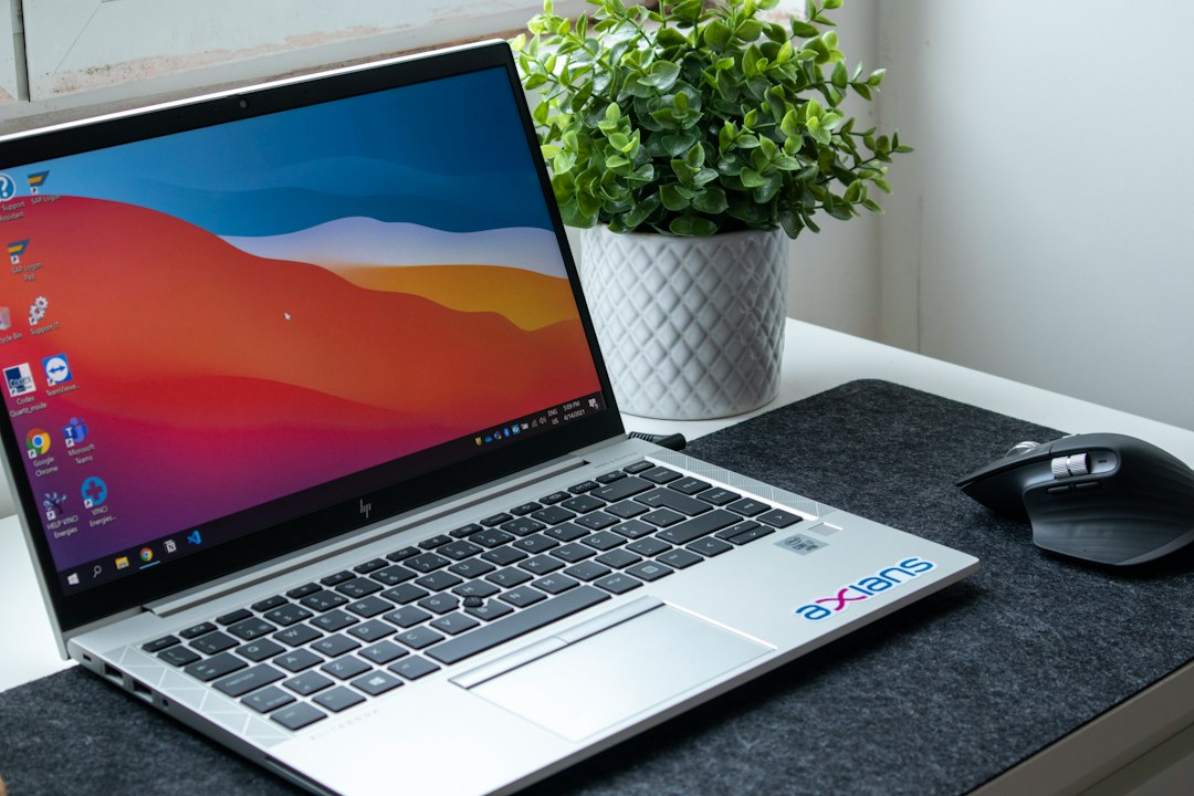 A black and silver Windows laptop on a desk, representing the everyday Windows laptops Get Like New sells as unboxed and refurbished devices
