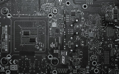 Close-up of a graphics card PCB, the kind of circuitry counterfeiters try to replicate in fake RTX 4090 scams