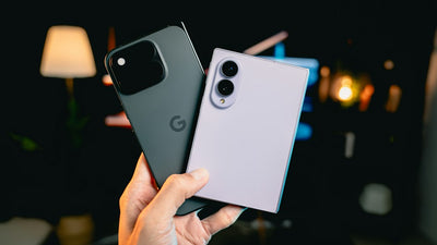 Two smartphones held side by side for comparison, representing the brand-stability question buyers face when choosing a phone in India