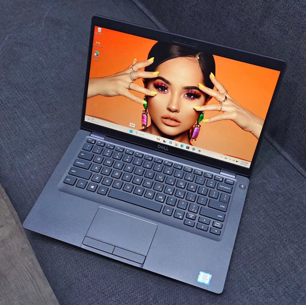 Dell Latitude 5400 refurbished business laptop with Intel Core i5, 8GB RAM, and 256GB SSD, shown on a desk.